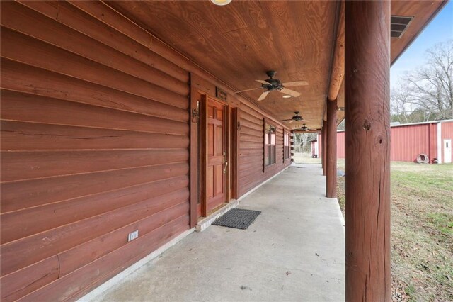 view of patio featuring ceiling fan