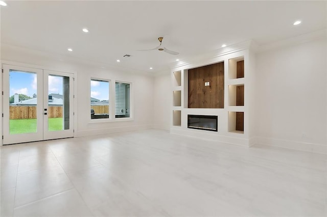 unfurnished living room with french doors, ceiling fan, crown molding, and built in shelves