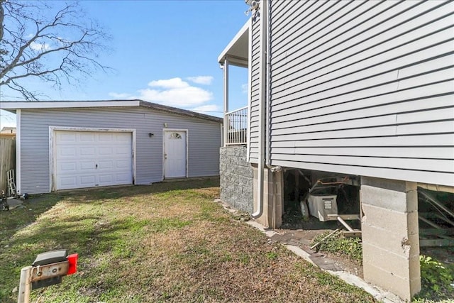 exterior space with an outdoor structure and a garage