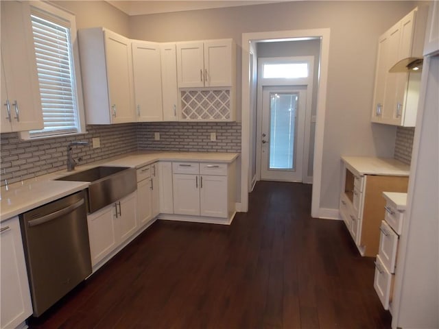 kitchen with dark hardwood / wood-style flooring, tasteful backsplash, white cabinetry, and dishwasher