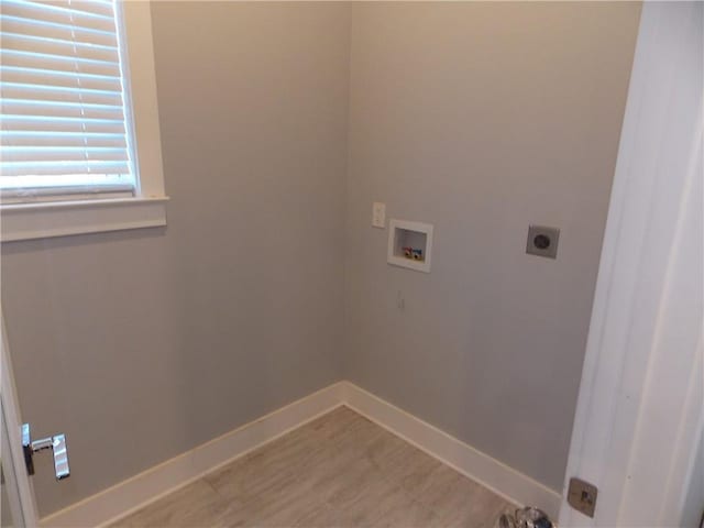 washroom with hookup for a washing machine and electric dryer hookup