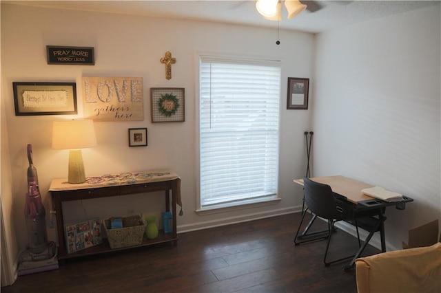 office area featuring dark hardwood / wood-style flooring, ceiling fan, and a wealth of natural light