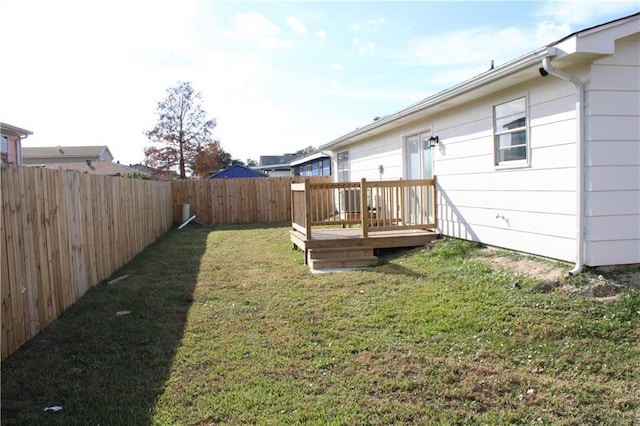 view of yard with a deck