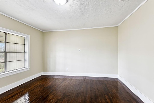 empty room featuring a textured ceiling, dark hardwood / wood-style floors, and crown molding