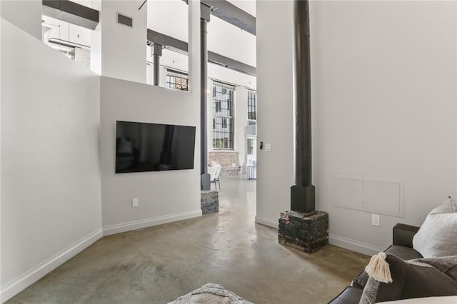 living room with a wood stove