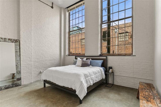 bedroom with concrete flooring