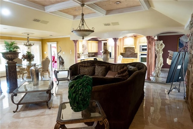 tiled living room featuring coffered ceiling, beamed ceiling, crown molding, decorative columns, and an inviting chandelier