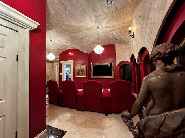 cinema room with wood ceiling, light tile flooring, and vaulted ceiling