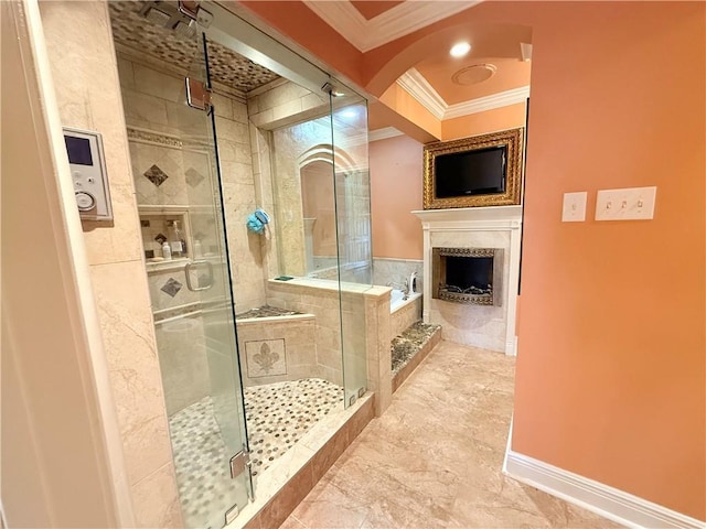 full bathroom with a fireplace, ornamental molding, a stall shower, baseboards, and a bath