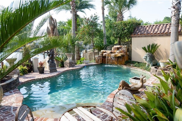 view of pool featuring fence and a fenced in pool