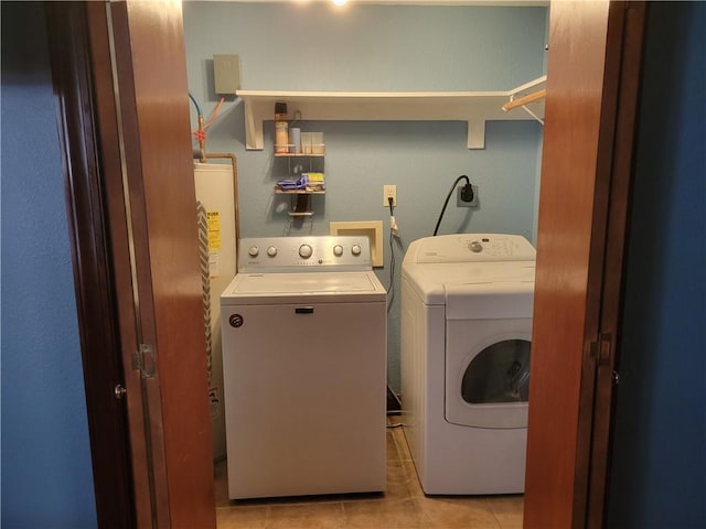 washroom featuring independent washer and dryer, washer hookup, hookup for an electric dryer, and light tile floors