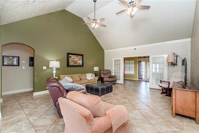 living room with ceiling fan, light tile flooring, high vaulted ceiling, a textured ceiling, and french doors