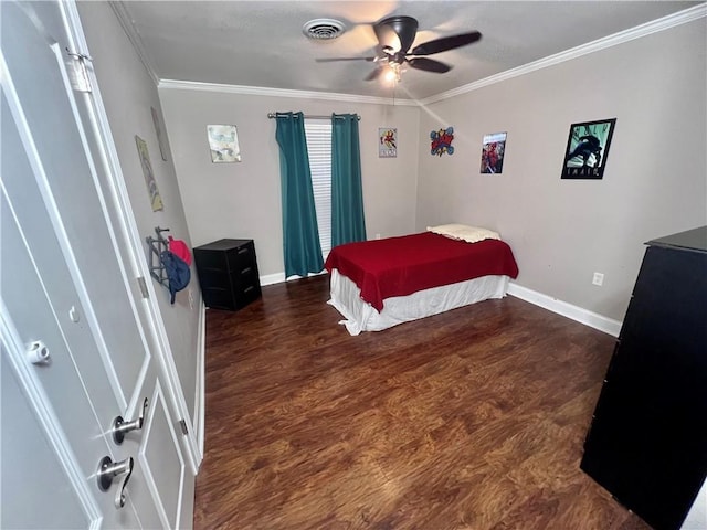 bedroom featuring crown molding, ceiling fan, and dark hardwood / wood-style flooring