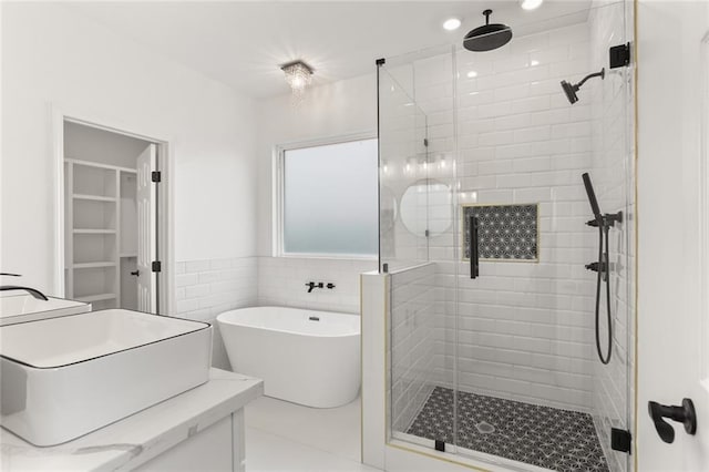 bathroom featuring an enclosed shower