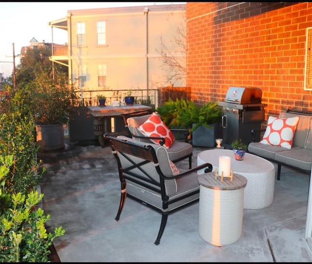 view of patio / terrace with an outdoor living space and area for grilling