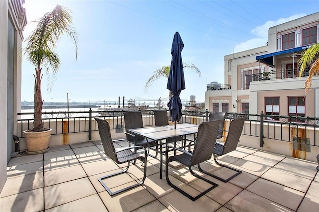 view of patio featuring a water view