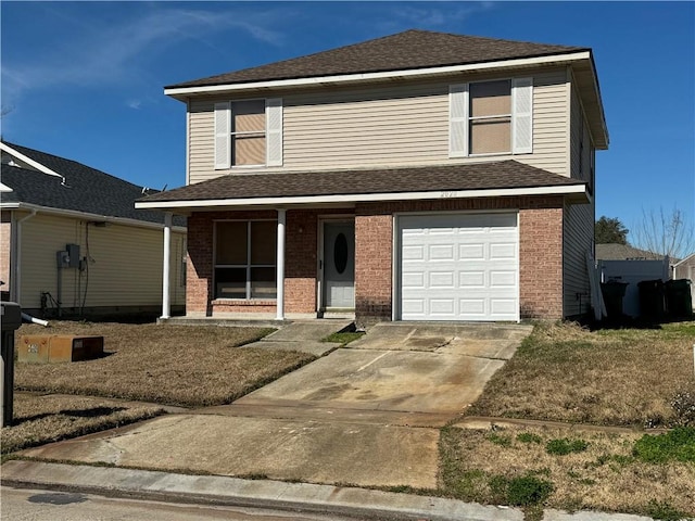 front of property with a garage