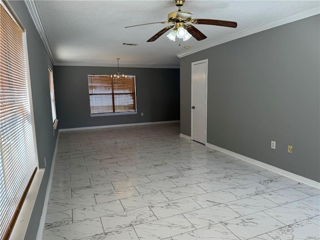 tiled empty room featuring a textured ceiling, ornamental molding, and ceiling fan with notable chandelier