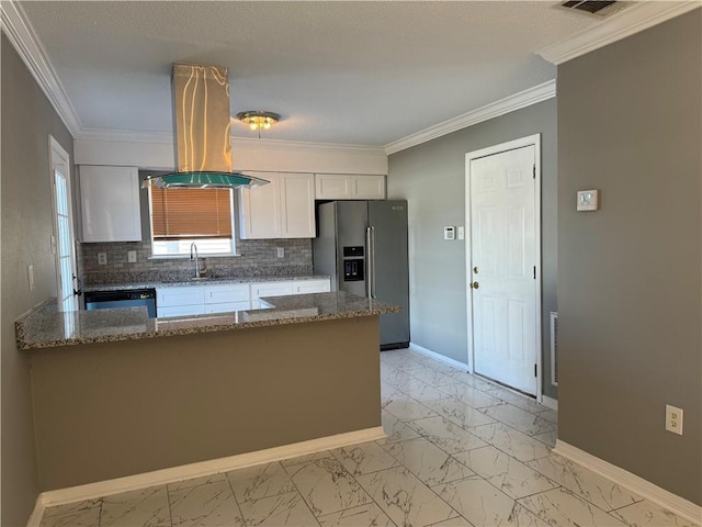 kitchen with appliances with stainless steel finishes, backsplash, dark stone countertops, island exhaust hood, and white cabinets