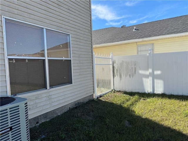 view of yard featuring central AC