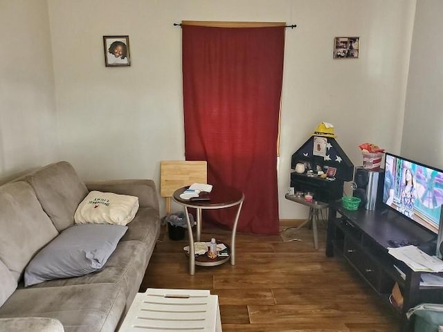 living room with dark wood-type flooring