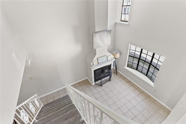 stairway with hardwood / wood-style flooring