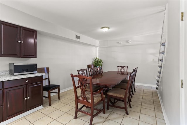 view of tiled dining room