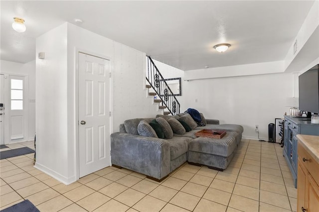 300-02 33rd St, New Orleans, LA 70124 - living area featuring light tile patterned floors and stairs