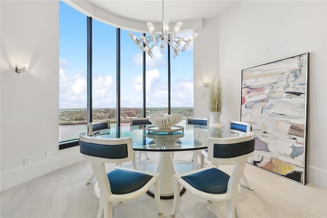 tiled dining space featuring expansive windows, plenty of natural light, and a chandelier