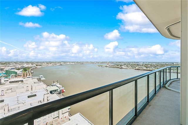 balcony featuring a water view