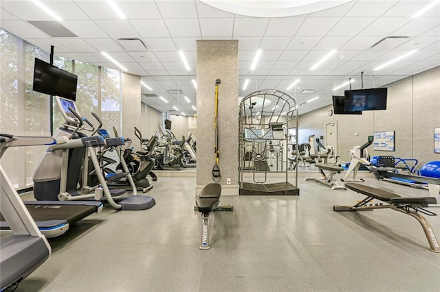 gym featuring a drop ceiling