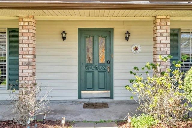 entrance to property with covered porch