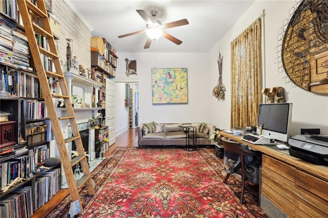 office area featuring ceiling fan and dark wood-type flooring