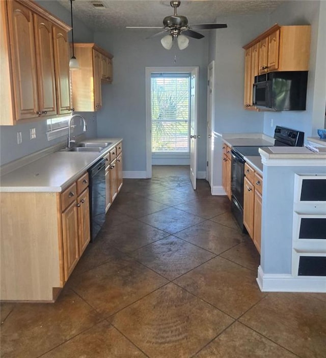 kitchen featuring a textured ceiling, black appliances, ceiling fan, and pendant lighting