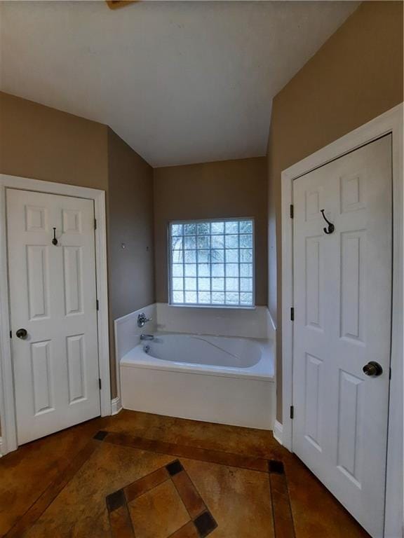 bathroom with a washtub