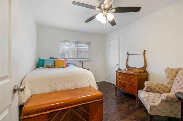 bedroom featuring dark hardwood / wood-style floors and ceiling fan