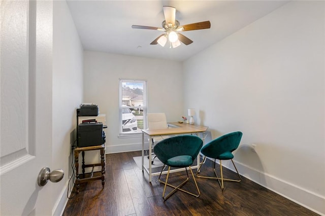 office space featuring dark hardwood / wood-style flooring and ceiling fan