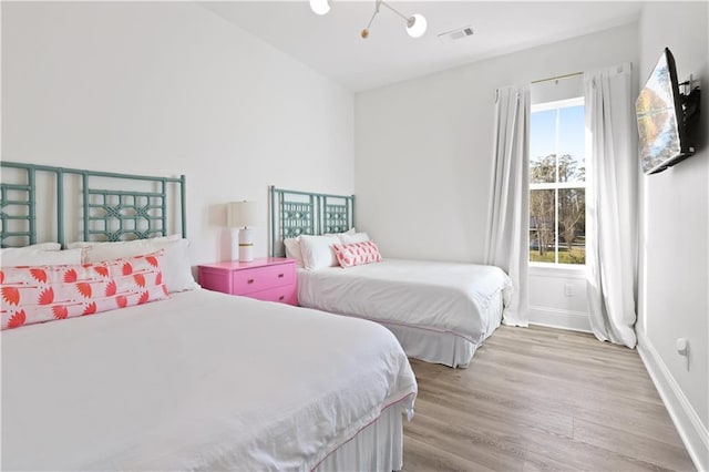 bedroom featuring light hardwood / wood-style floors