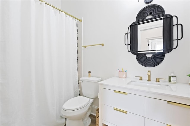 bathroom with oversized vanity and toilet