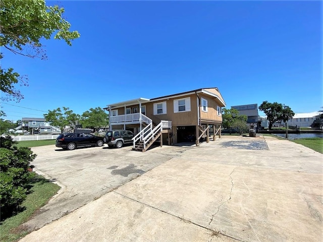 view of front of home featuring a carport