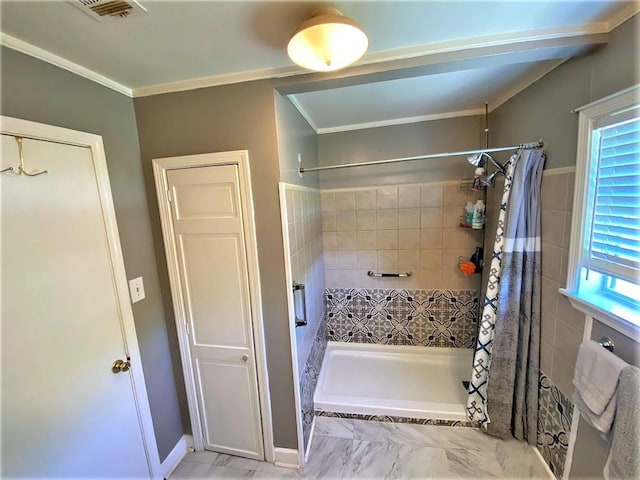 bathroom featuring crown molding and tile flooring