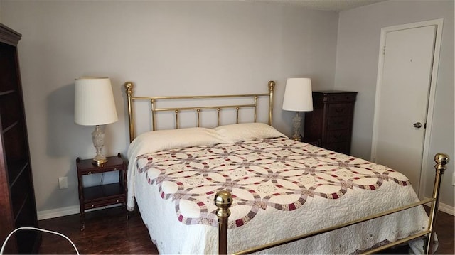 bedroom featuring dark hardwood / wood-style floors