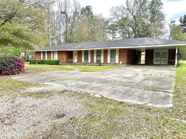 ranch-style house with a carport