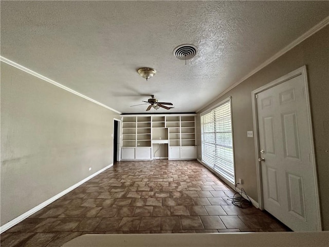 unfurnished room featuring a textured ceiling, ceiling fan, and ornamental molding