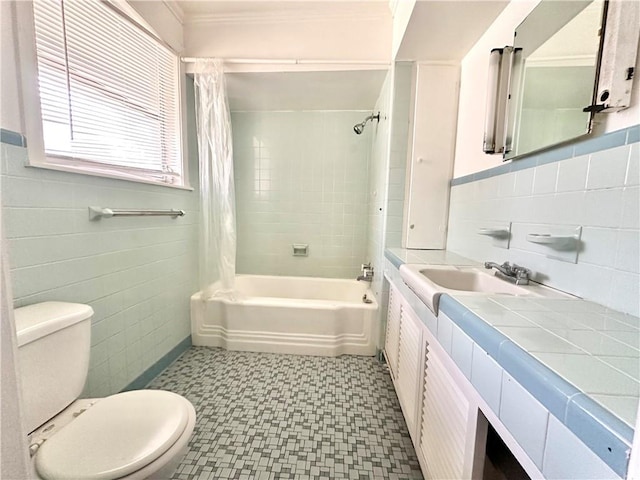 full bathroom featuring vanity, tile walls, shower / bathtub combination with curtain, tile flooring, and toilet