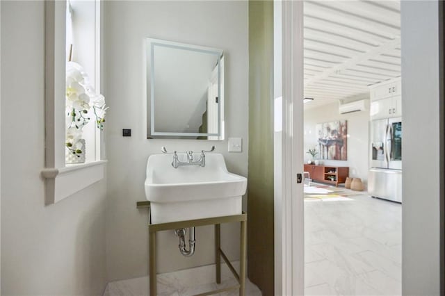 bathroom featuring a wall mounted AC and tile flooring