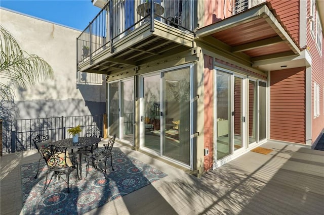 wooden deck featuring a patio area