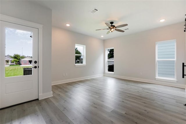 interior space featuring light hardwood / wood-style flooring and ceiling fan