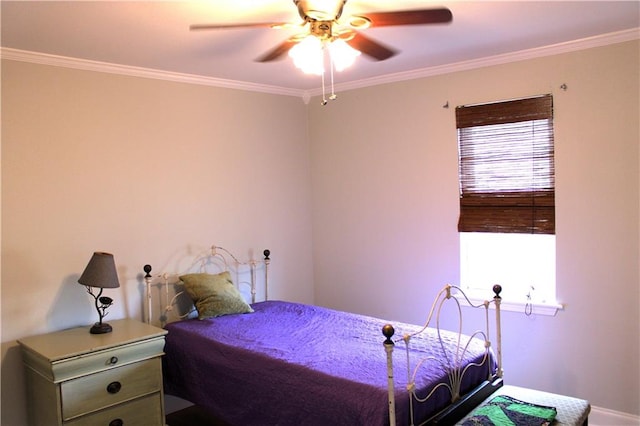 bedroom featuring ceiling fan and crown molding