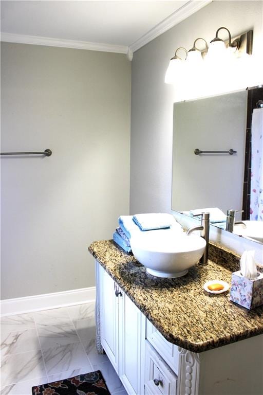 bathroom featuring vanity and crown molding